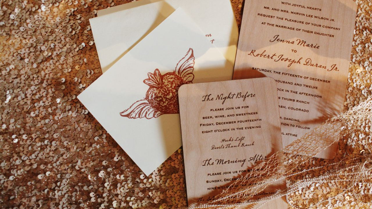 Laser engraved wedding invitations