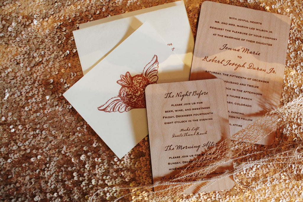 Laser engraved wedding invitations